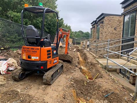 mini digger hire north shore|mini digger hire with man.